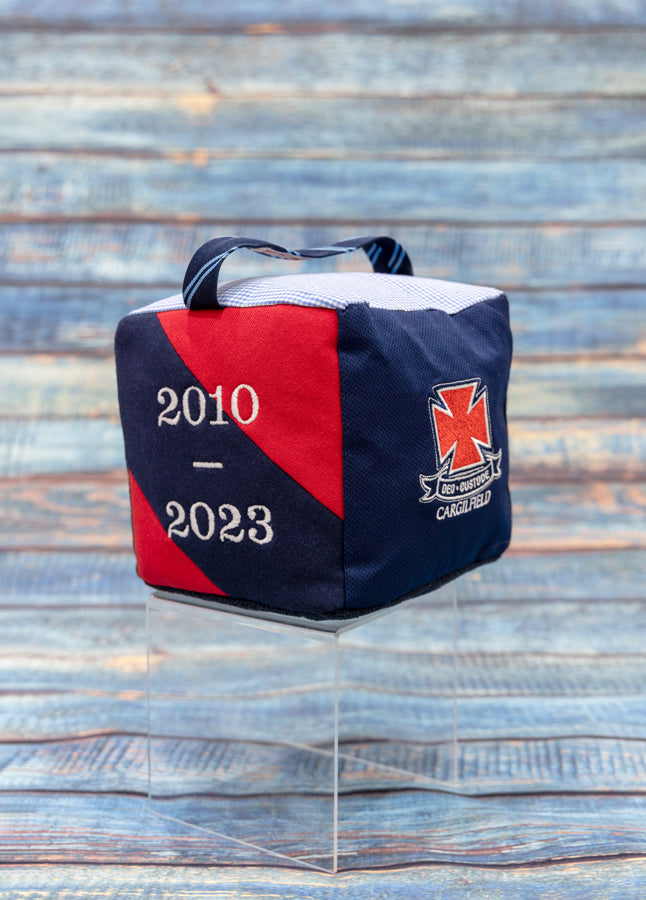 A fabric doorstop made from scraps of Cargilfield School uniform. Can be personalised with any details, an ideal teacher appreciation gift